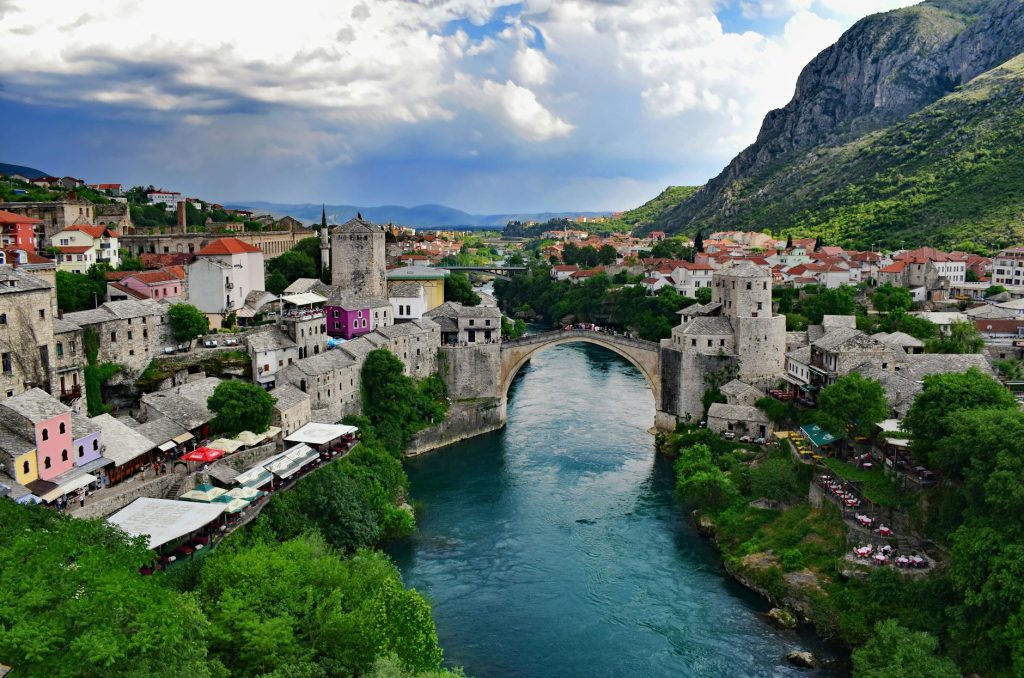 aerial view of the arch stari most or old bridge crossing the neretva river in bosnia and herzegovina